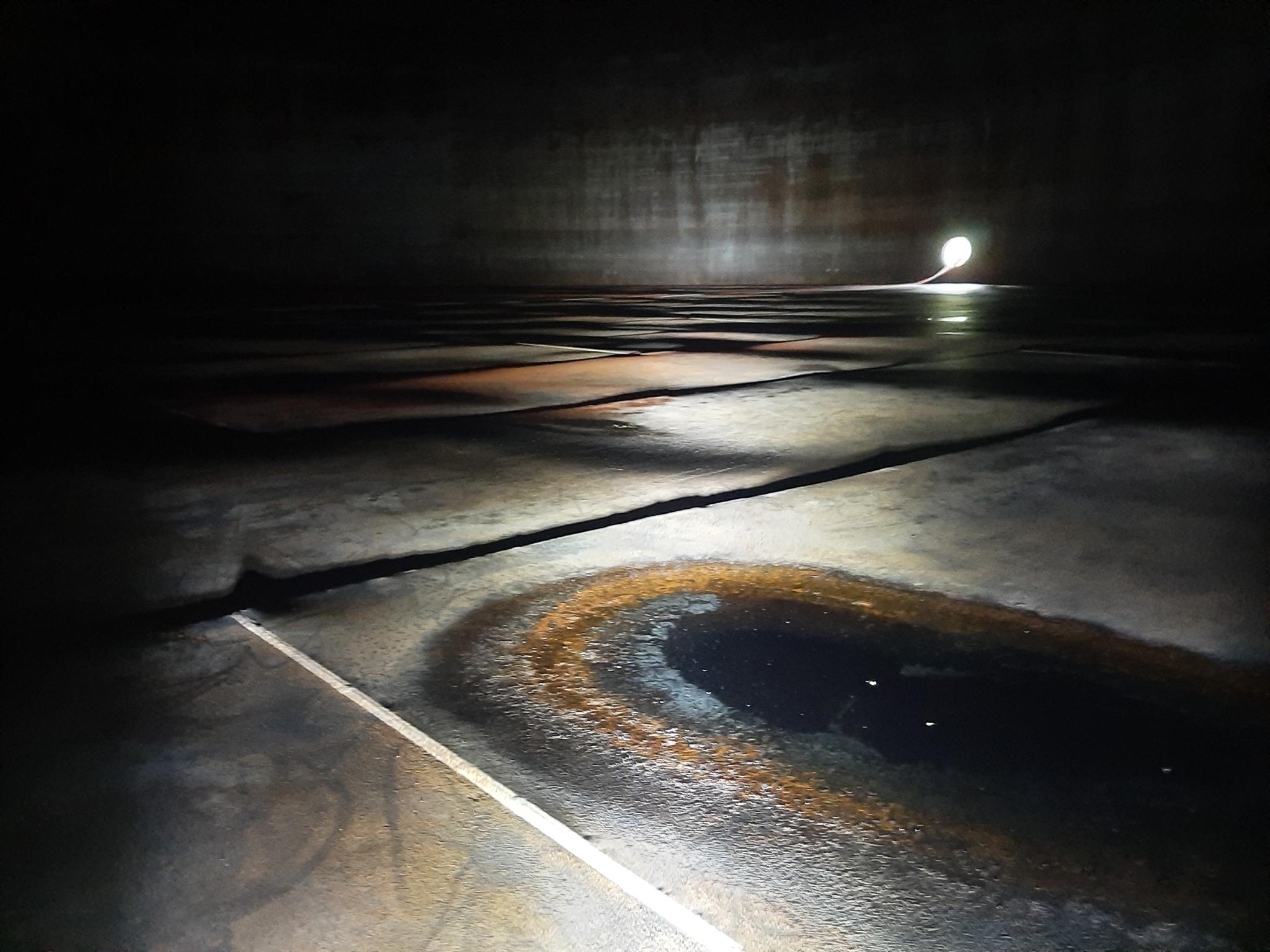Robotic inspection of a tank floor